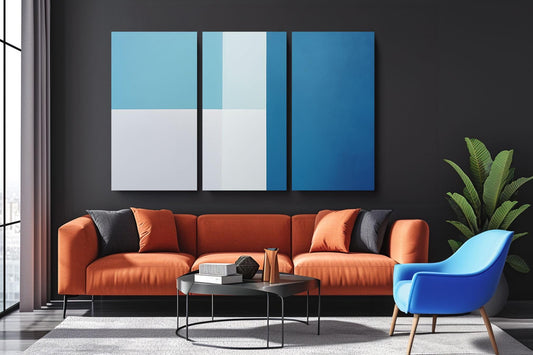 a living room with a couch and two chairs