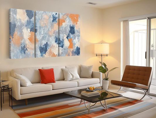 a living room filled with furniture and a painting on the wall
