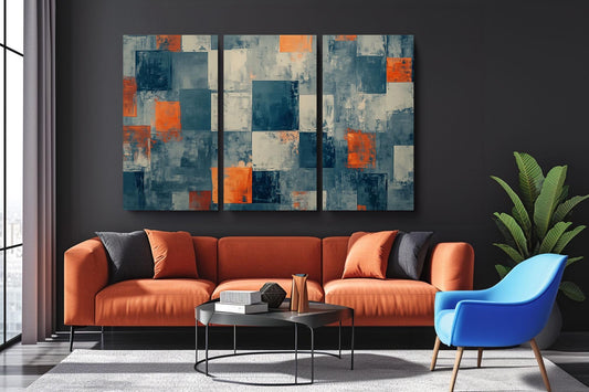 a living room with a couch and two chairs