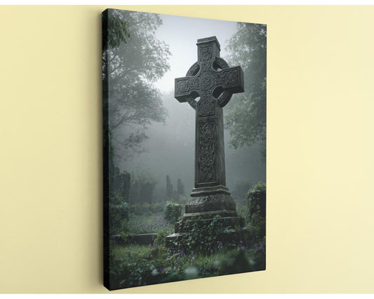 a large, ornate stone cross standing in a foggy, wooded cemetery.