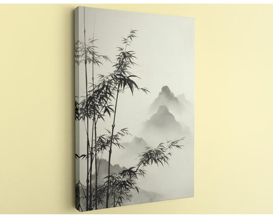 A black and white image depicting bamboo plants with a misty mountain landscape in the background.
