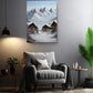 a cozy living room with a comfortable gray armchair, a wooden side table, and a potted plant. Above the armchair, there is a large painting of a snowy mountain village with wooden houses and a ski slope.