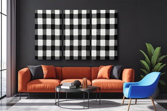 a living room with a couch, chair and a painting on the wall