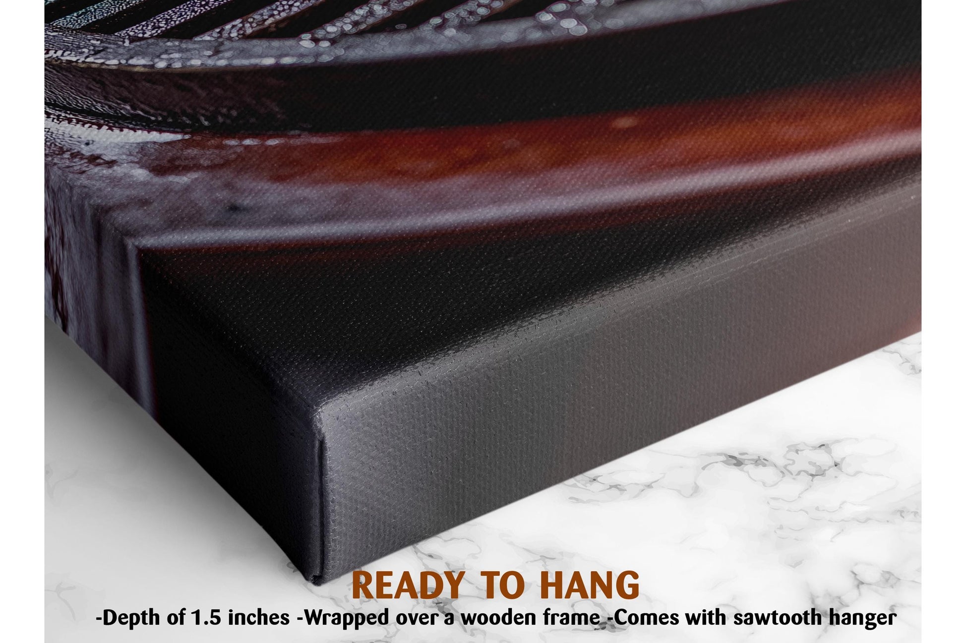 The image is a close-up of a black metal object, possibly a piece of machinery or a tool, with a wooden frame. The object is placed on a white marble surface, which has a text overlay that reads &quot;READY TO HANG&quot; and provides the dimensions of the object, stating it is 1.5 inches deep and wrapped over a wooden frame.