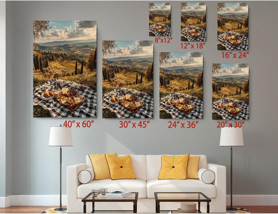 The image is a living room with a white couch and a coffee table. Above the couch, there are six framed pictures of landscapes, each with a different size and resolution, ranging from 40 x 60 to 24 x 36. The pictures are arranged in a grid-like pattern on the wall, creating a visually appealing display.