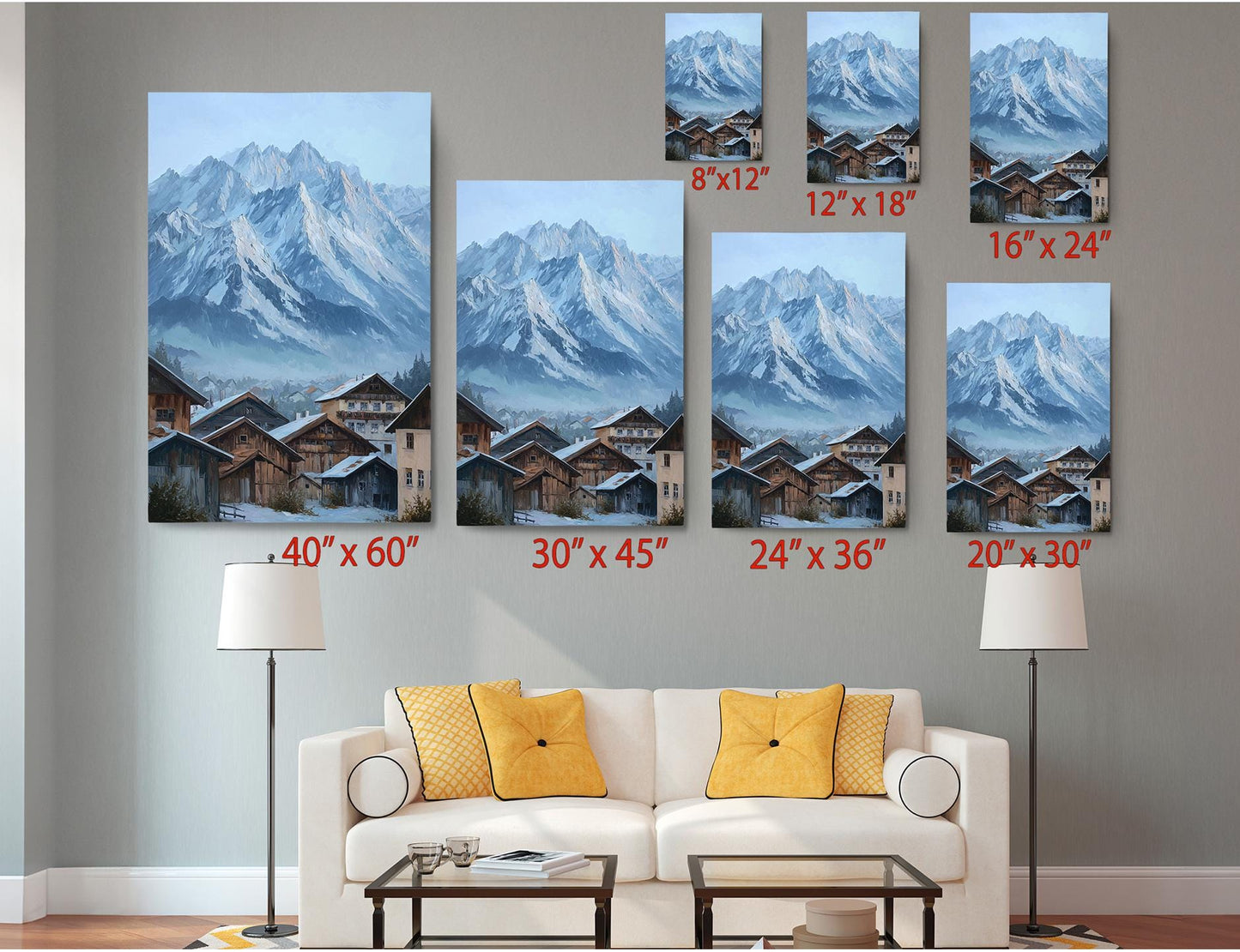 a living room with a white sofa and a coffee table, and several framed pictures of snowy mountain landscapes displayed on the wall above the sofa.