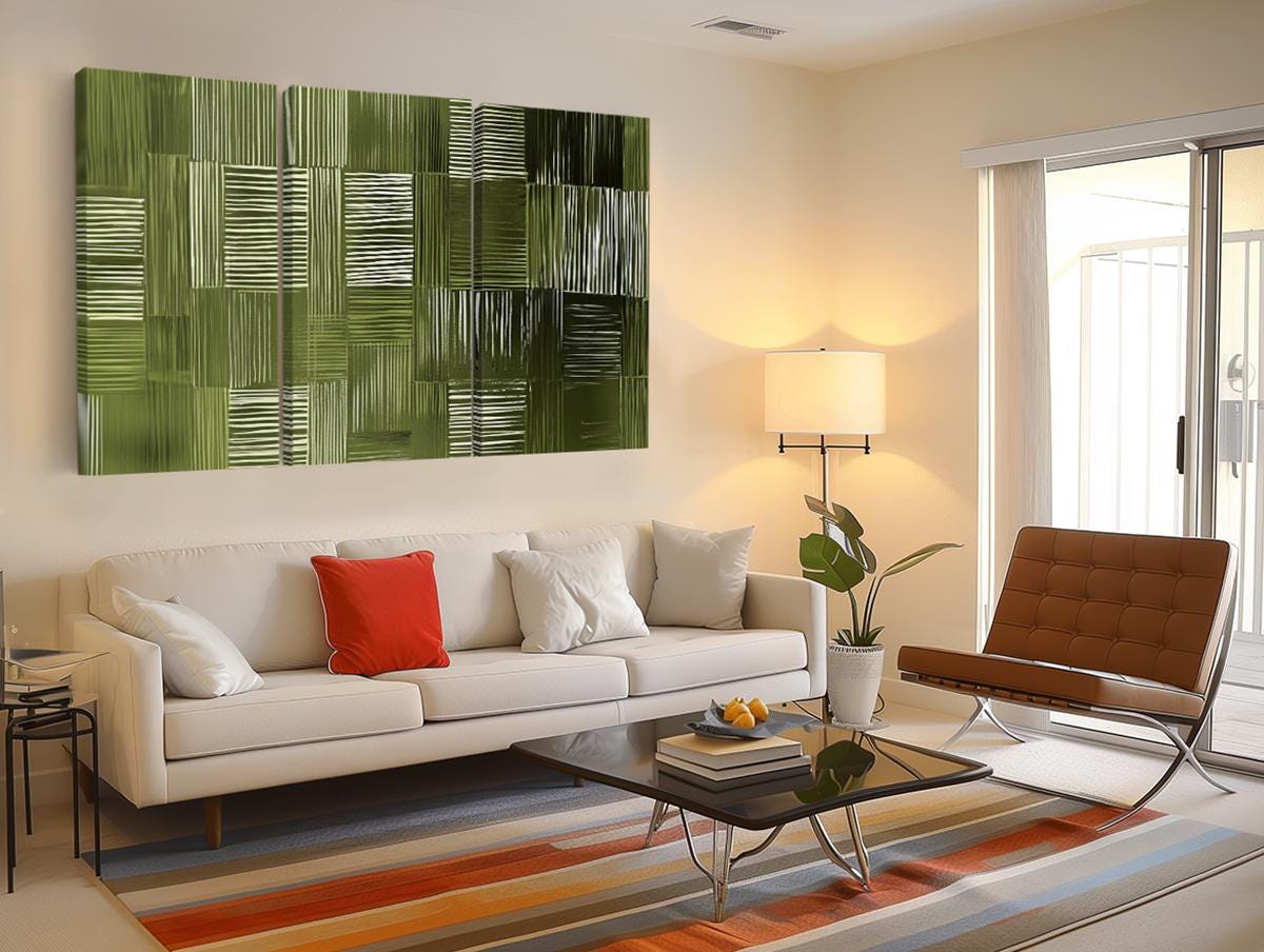 a living room filled with furniture and a painting on the wall