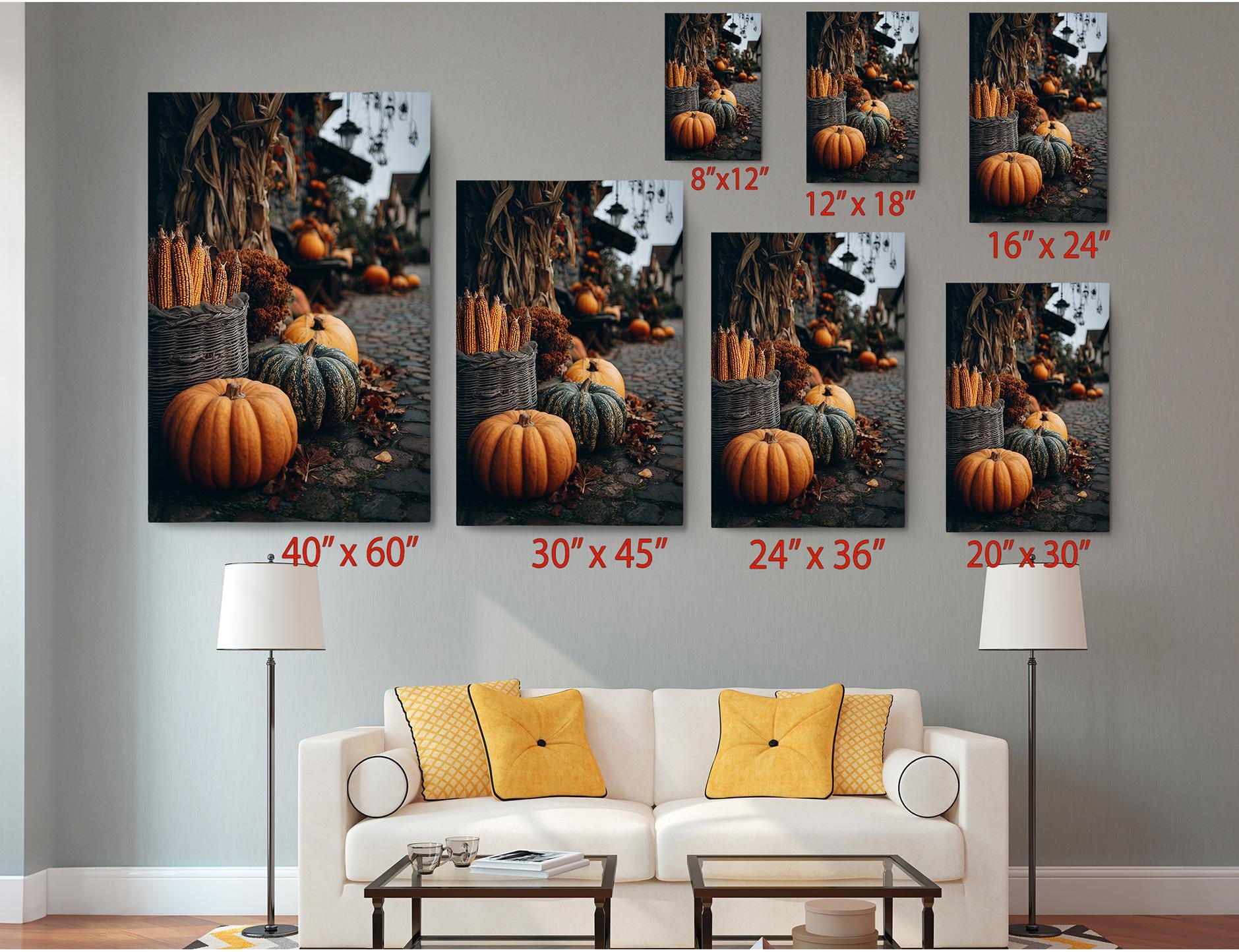 The image is a living room with a white sofa and a coffee table. Above the sofa, there are six framed pictures of pumpkins and gourds, each with a different size and orientation. The pictures are arranged in a grid-like pattern on the wall, creating a visually appealing display.