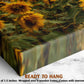 The image is a close-up of a canvas print featuring a vibrant display of sunflowers. The print is described as a &quot;Ready to Hang&quot; and is framed by a wooden frame. The print is described as having a depth of 1.5 inches and is wrapped over a wooden frame. It is also noted that the print comes with a sawtooth hanger.