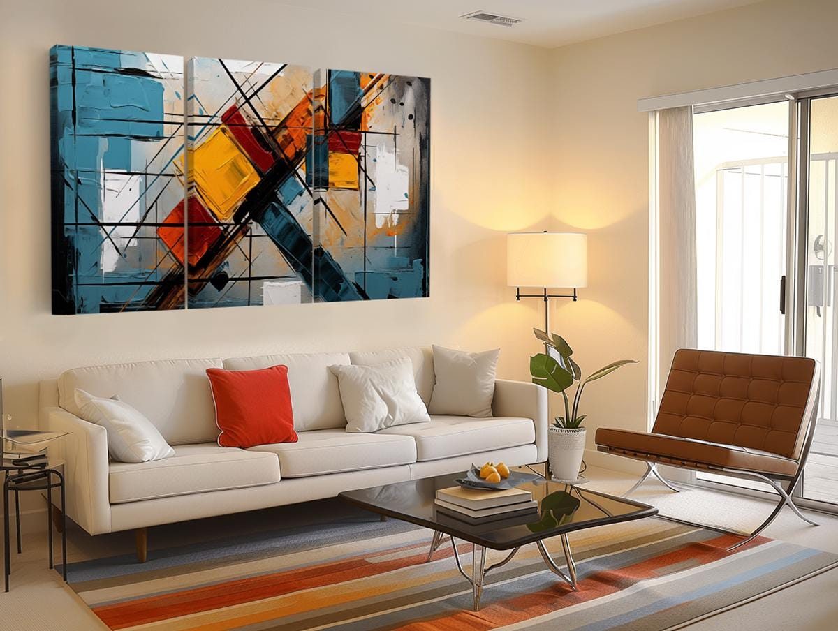 a living room filled with furniture and a painting on the wall