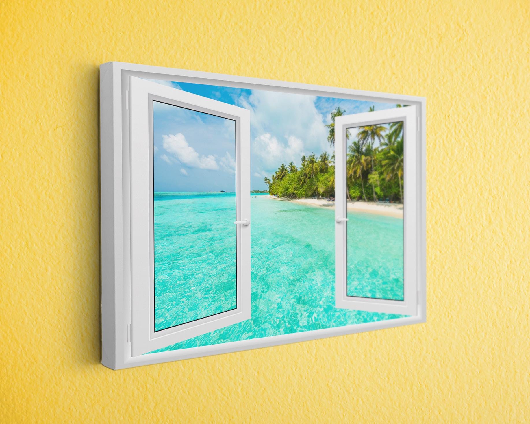 an open window with a view of a tropical beach