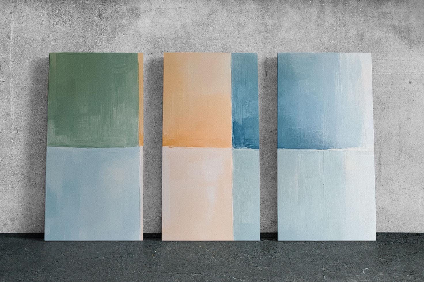 three paintings of different colors on a wall