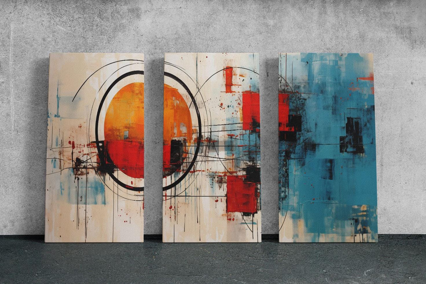 three abstract paintings on a wall in a room