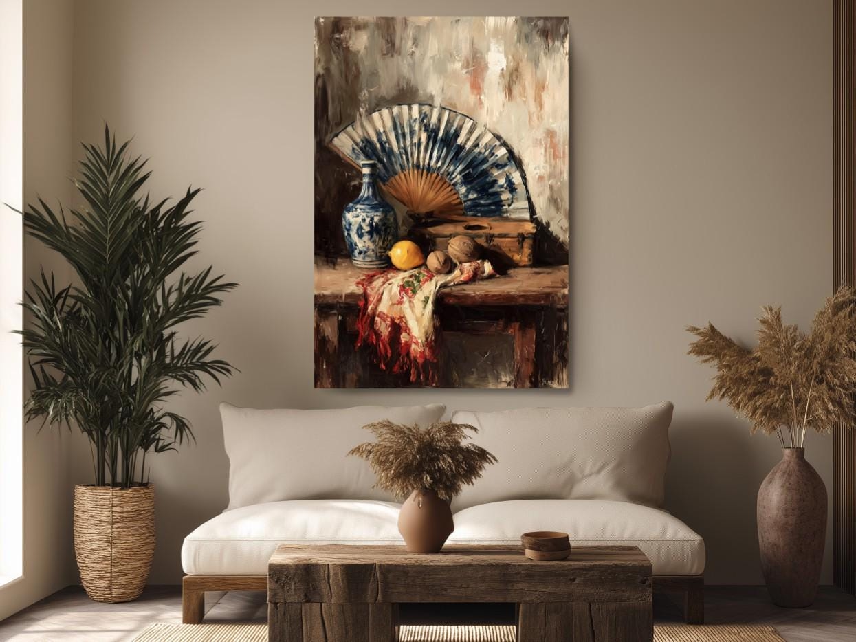 a living room with a large painting of a still life scene hanging on the wall, which includes a fan, a vase, and various fruits and flowers arranged on a table.