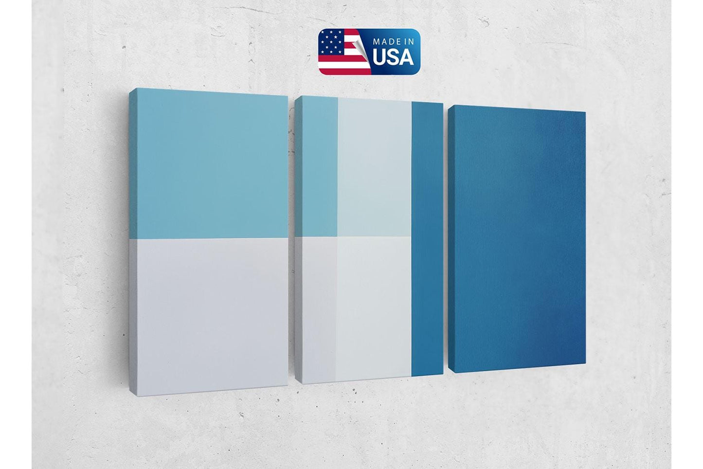 a set of three blue and white panels on a wall