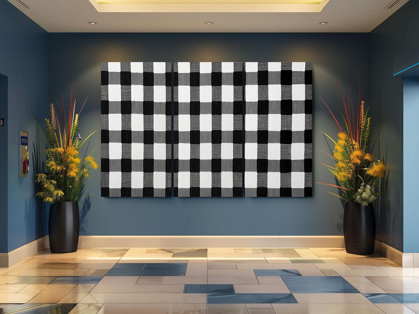 a black and white checkered wall hanging on a blue wall