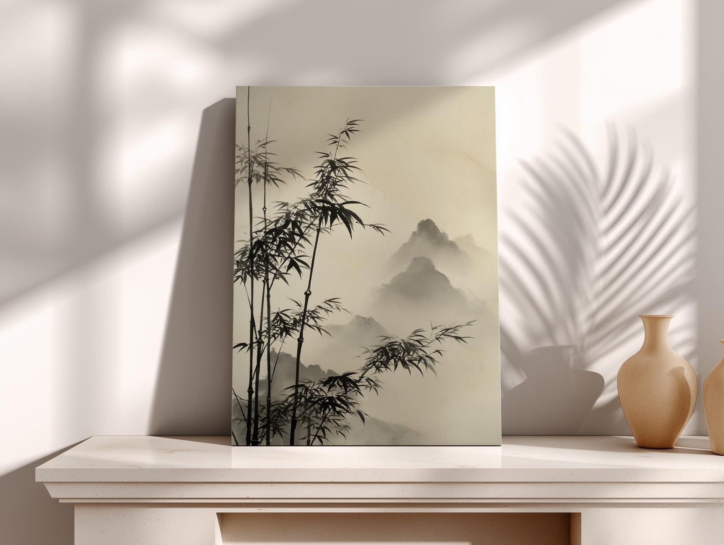 a minimalist art piece with a bamboo tree design and a misty mountain landscape in the background, displayed on a white shelf against a white wall.