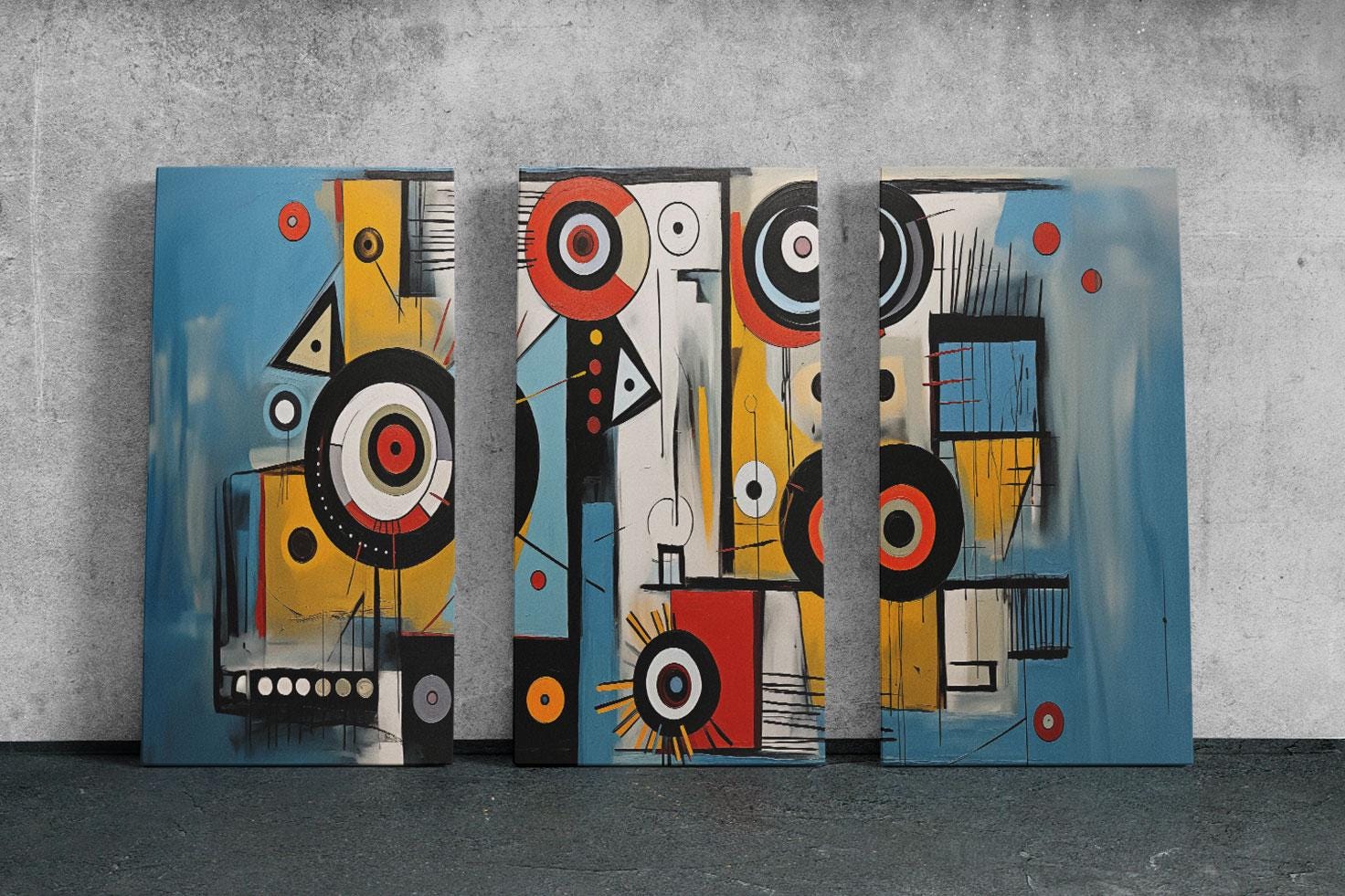 three abstract paintings on a concrete wall