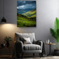 a serene living room with a comfortable gray armchair, a potted plant, and a painting of a picturesque countryside landscape hanging on the wall.