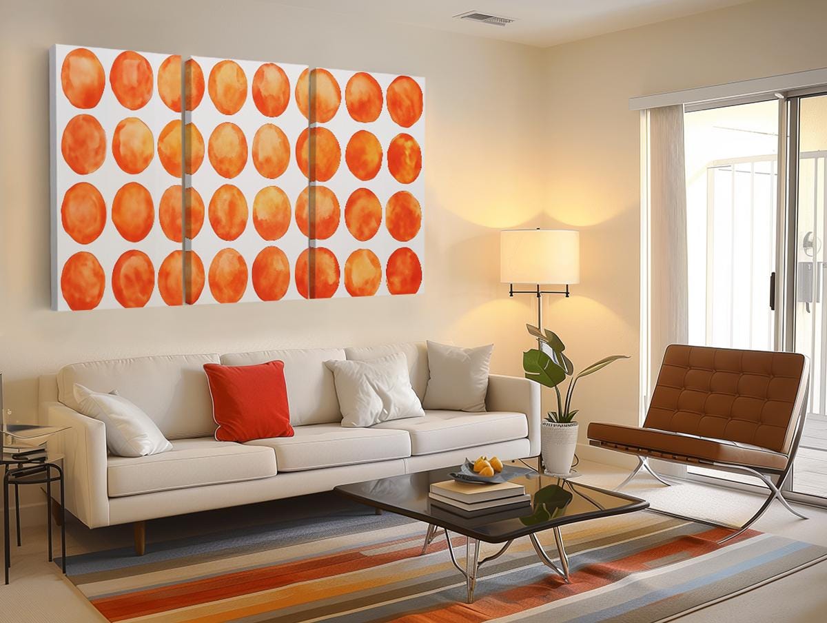 a living room filled with furniture and a painting on the wall