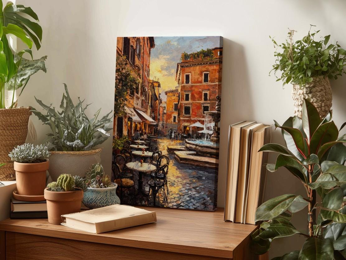 a wooden table with a painting of a street scene, surrounded by potted plants and books, creating a cozy and inviting atmosphere.