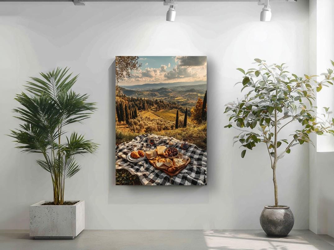 a scenic landscape with a picnic table set up in the foreground, featuring a checkered tablecloth and a variety of food items. The table is surrounded by potted plants, creating a serene and inviting atmosphere. The backdrop is a picturesque countryside with rolling hills and a clear blue sky.