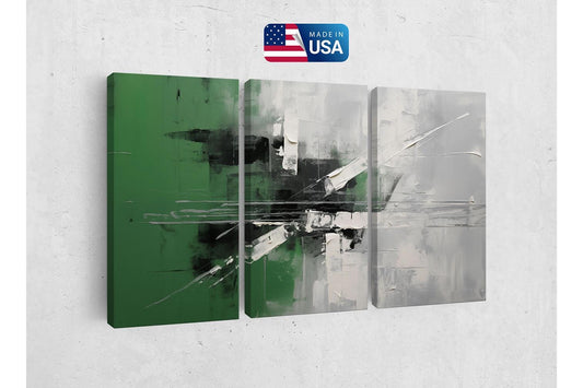 a green and white abstract painting on a wall