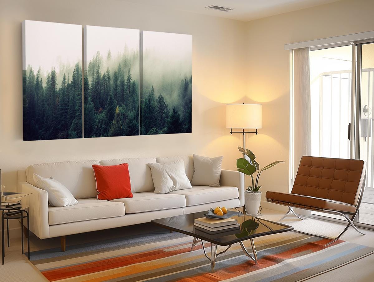 a living room filled with furniture and a painting on the wall