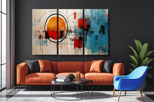 a living room with a couch and a painting on the wall