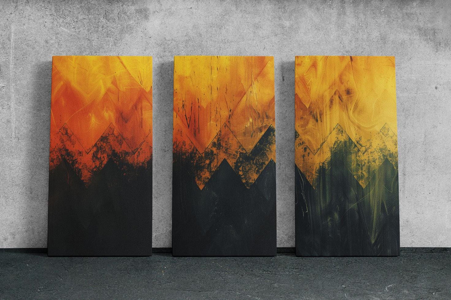 a group of three paintings sitting on top of a wall