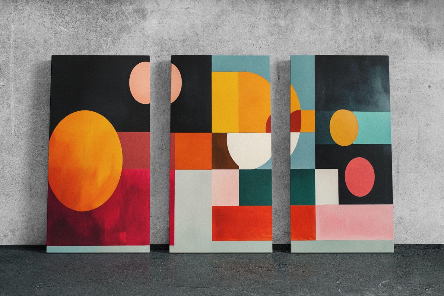 three paintings of different colors on a wall