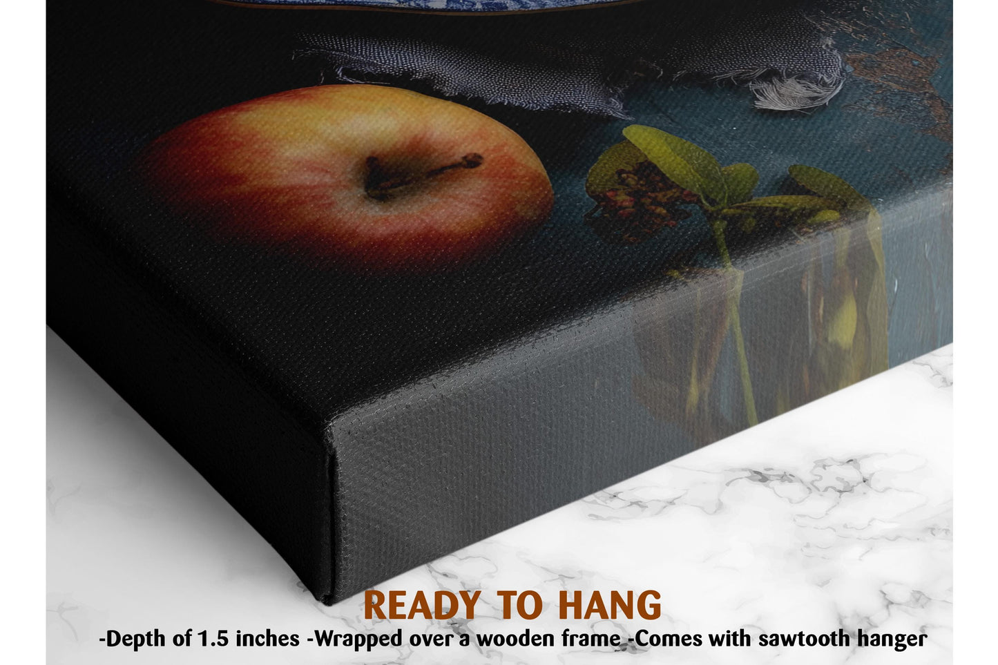The image is a close-up of a black canvas print featuring a vibrant red apple and a green plant, with a text overlay that reads &quot;READY TO HANG&quot; and provides the dimensions of the print as &quot;-1.5 inches&quot; and &quot;wrapped over a wooden frame.&quot;