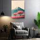 a cozy living room with a gray armchair, a potted plant, and a framed landscape painting depicting a mountain with pink trees.