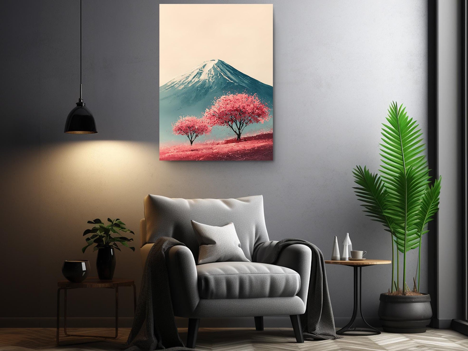 a cozy living room with a gray armchair, a potted plant, and a framed landscape painting depicting a mountain with pink trees.