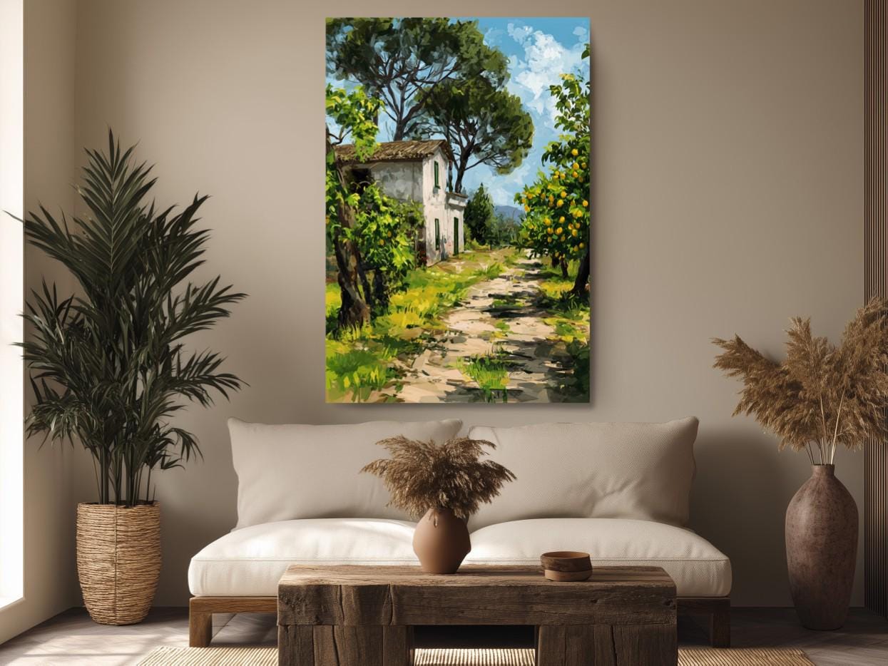 a cozy living room with a large painting of a house and a path leading to it hanging on the wall. The painting is surrounded by potted plants, a wooden coffee table, and a comfortable couch.