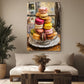 a cozy living room with a large painting of colorful macarons hanging on the wall above a wooden coffee table.