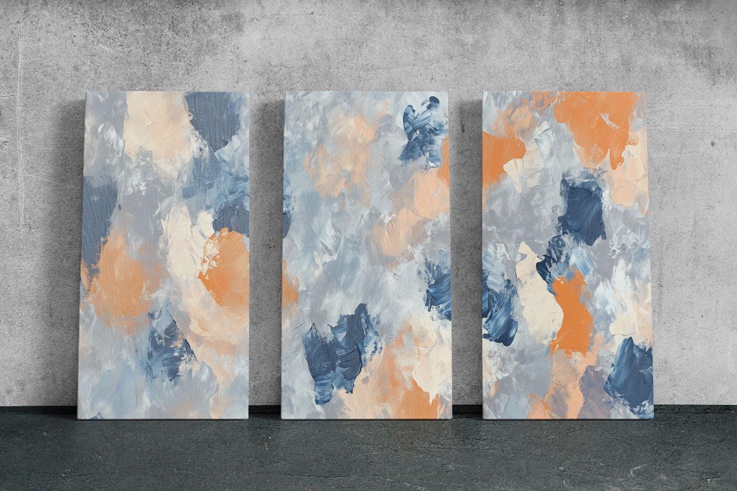 three abstract paintings on a concrete wall