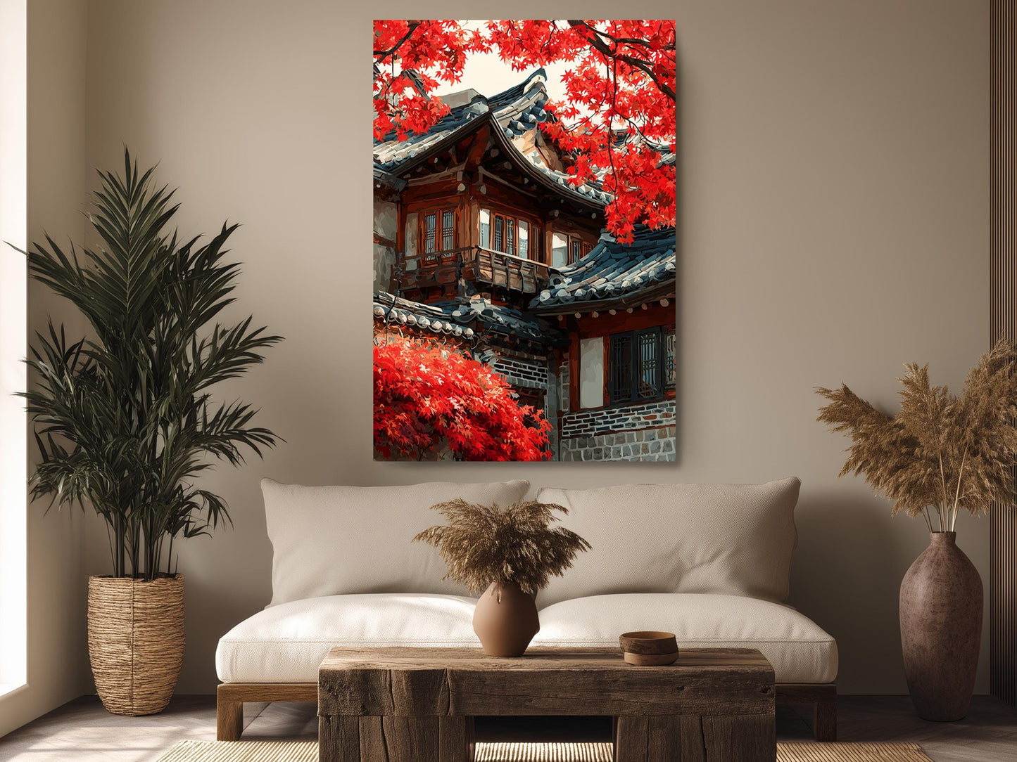 a living room with a large, colorful painting of a traditional Korean building with red flowers hanging above a white sofa. The room is decorated with potted plants and a wooden coffee table.
