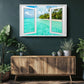 a picture of an open window with a tropical island in the background