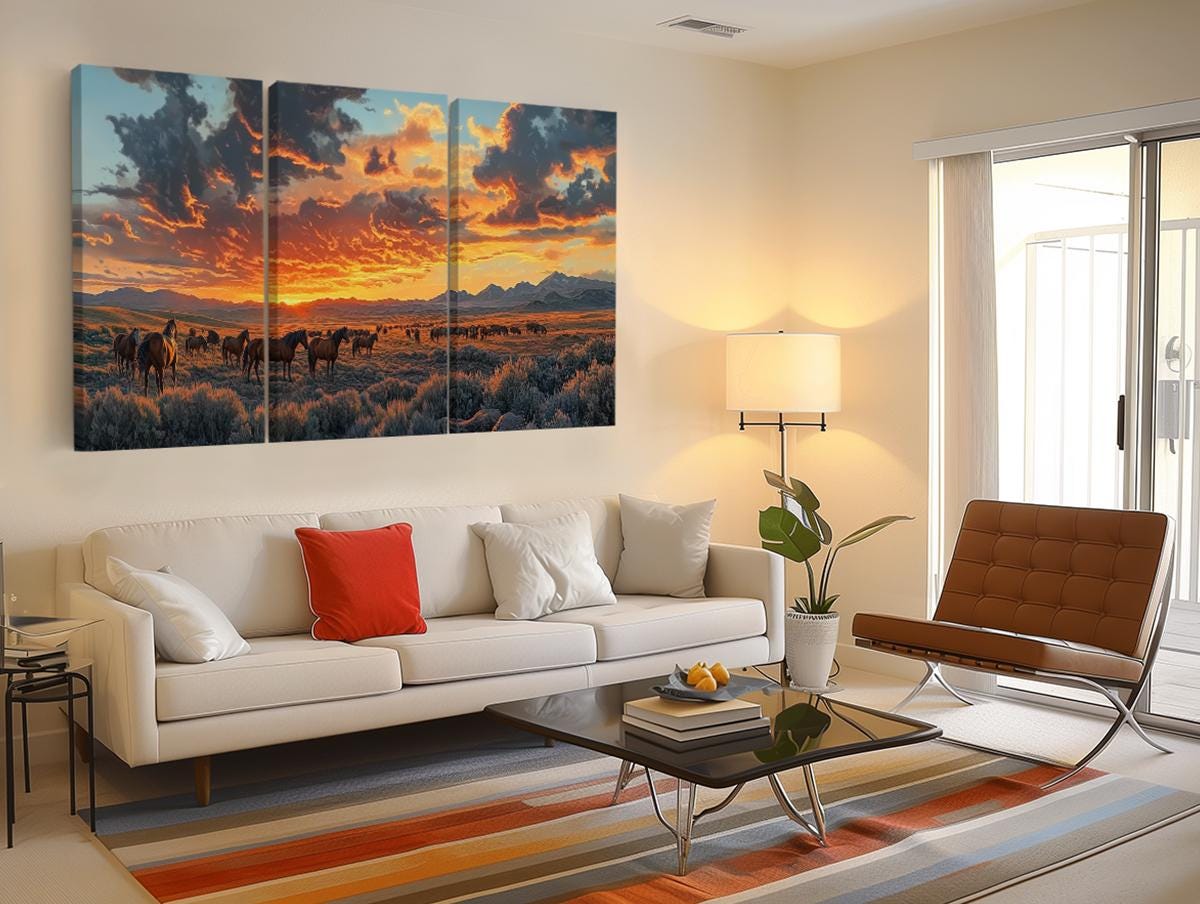 a living room filled with furniture and a painting on the wall
