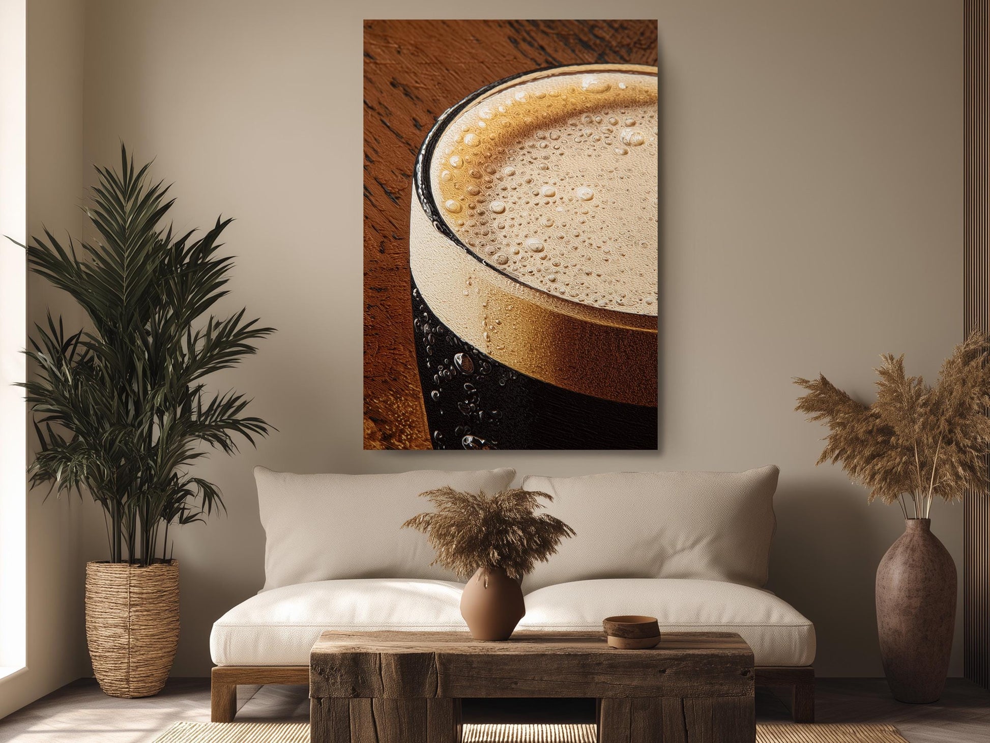 a cozy living room with a large framed photograph of a glass of beer hanging on the wall above a wooden coffee table. The room is decorated with potted plants, a vase, and a rug, creating a warm and inviting atmosphere.
