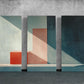three paintings of different colors on a wall