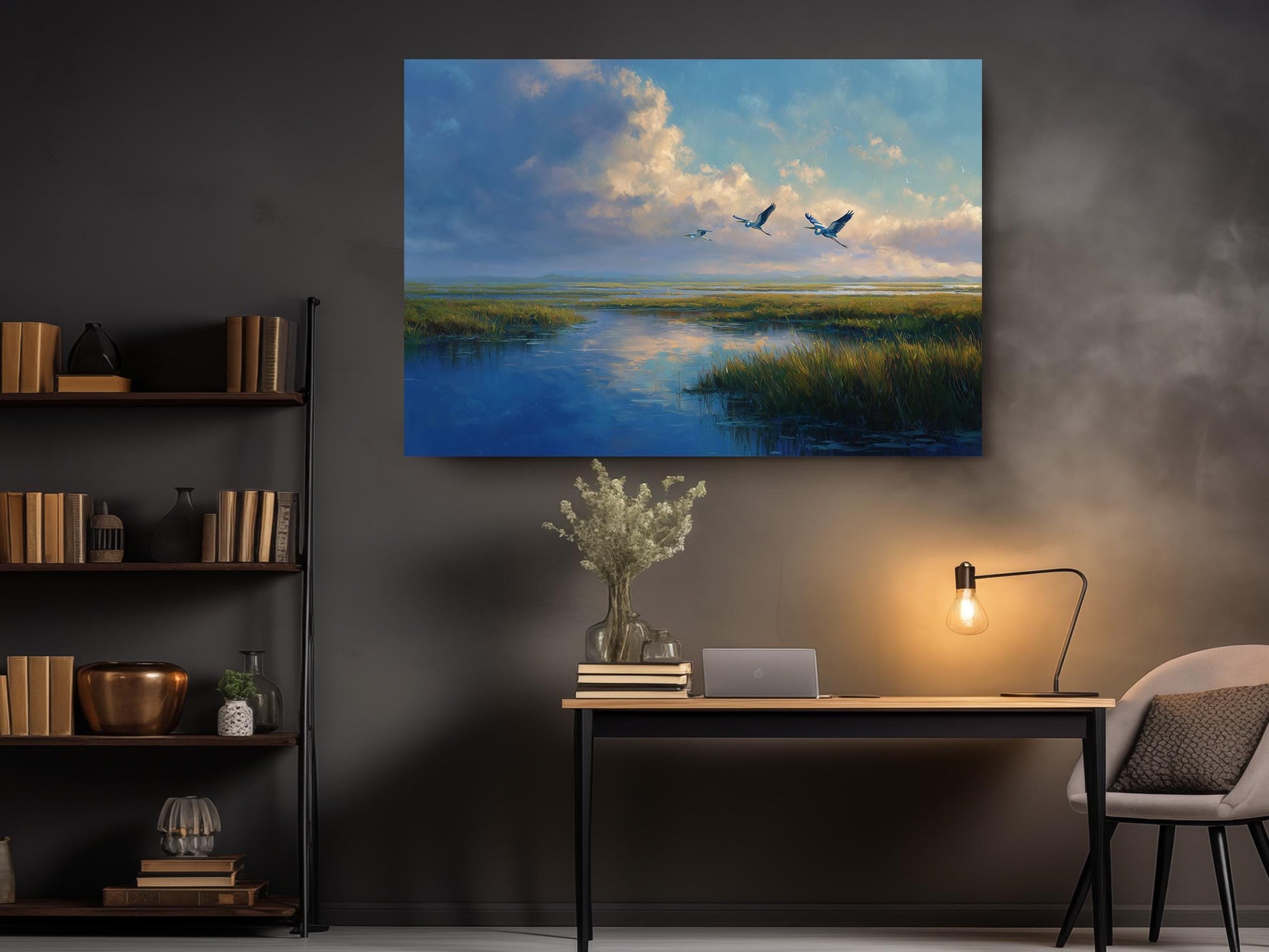 a serene indoor setting with a large painting of a tranquil landscape hanging on the wall above a wooden desk. The painting depicts a peaceful scene of a river flowing through a grassy field, with a few birds flying in the sky. The desk is positioned under the painting, and a lamp is placed on the desk, providing a warm and inviting atmosphere. The room also contains a bookshelf filled with various books and decorative items, creating a cozy and intellectual ambiance.