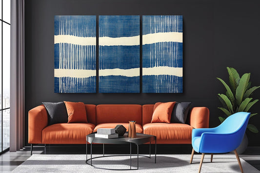 a living room with a couch and two chairs