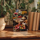 a wooden table with a framed photograph of a fruit and vegetable market displayed on it. The table is surrounded by potted plants, and there are several books placed next to the table.