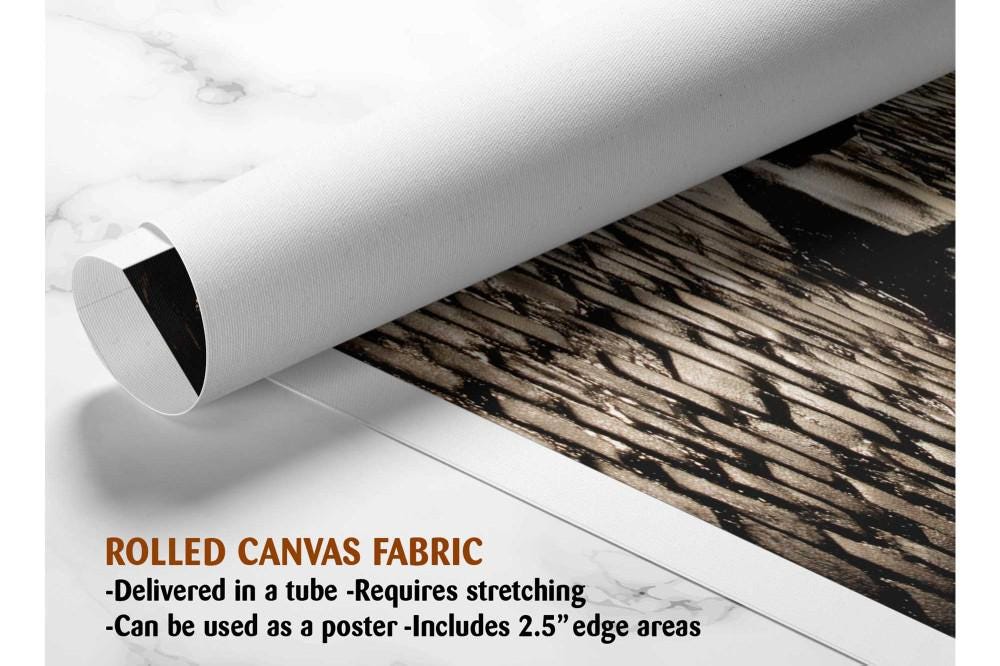 The image is a rolled canvas fabric, which is a type of canvas material used for creating posters or wall art. It is described as a tube-delivered fabric, which means it is delivered in a tube and requires stretching before use. The fabric can be used as a poster and includes a 2.5&quot; edge area.