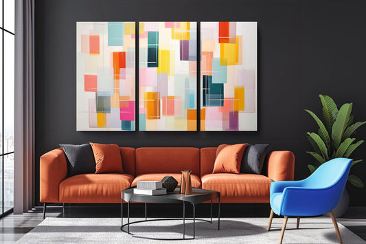 a living room with a couch a chair and a painting on the wall