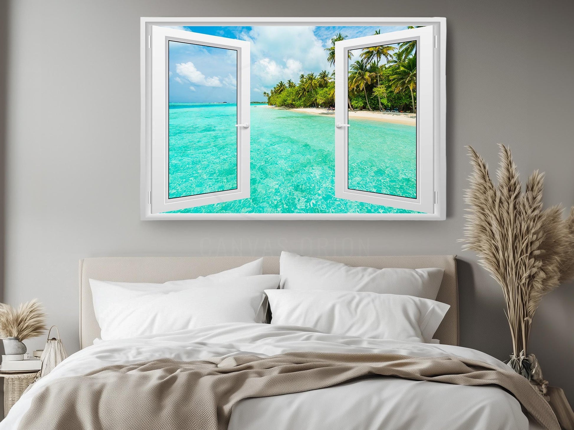 a bedroom with an open window to a tropical beach