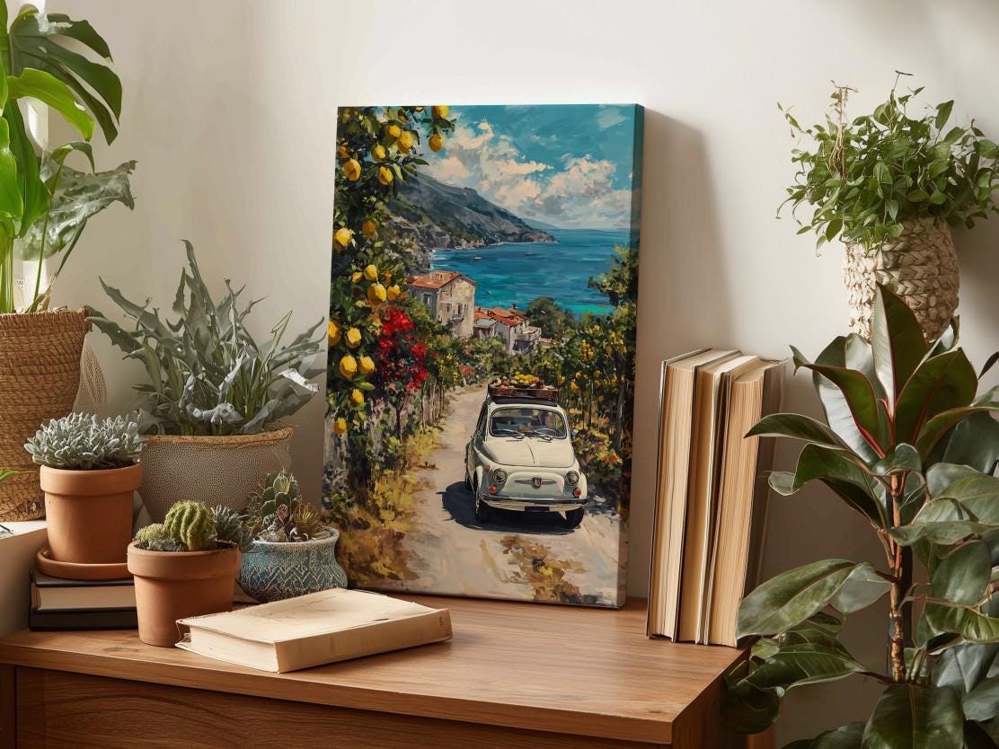 a painting of a car driving down a road surrounded by lush greenery, with a picturesque coastal town in the background.