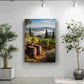 a large painting of a vineyard with barrels in the foreground, set against a backdrop of rolling hills and a blue sky with clouds.